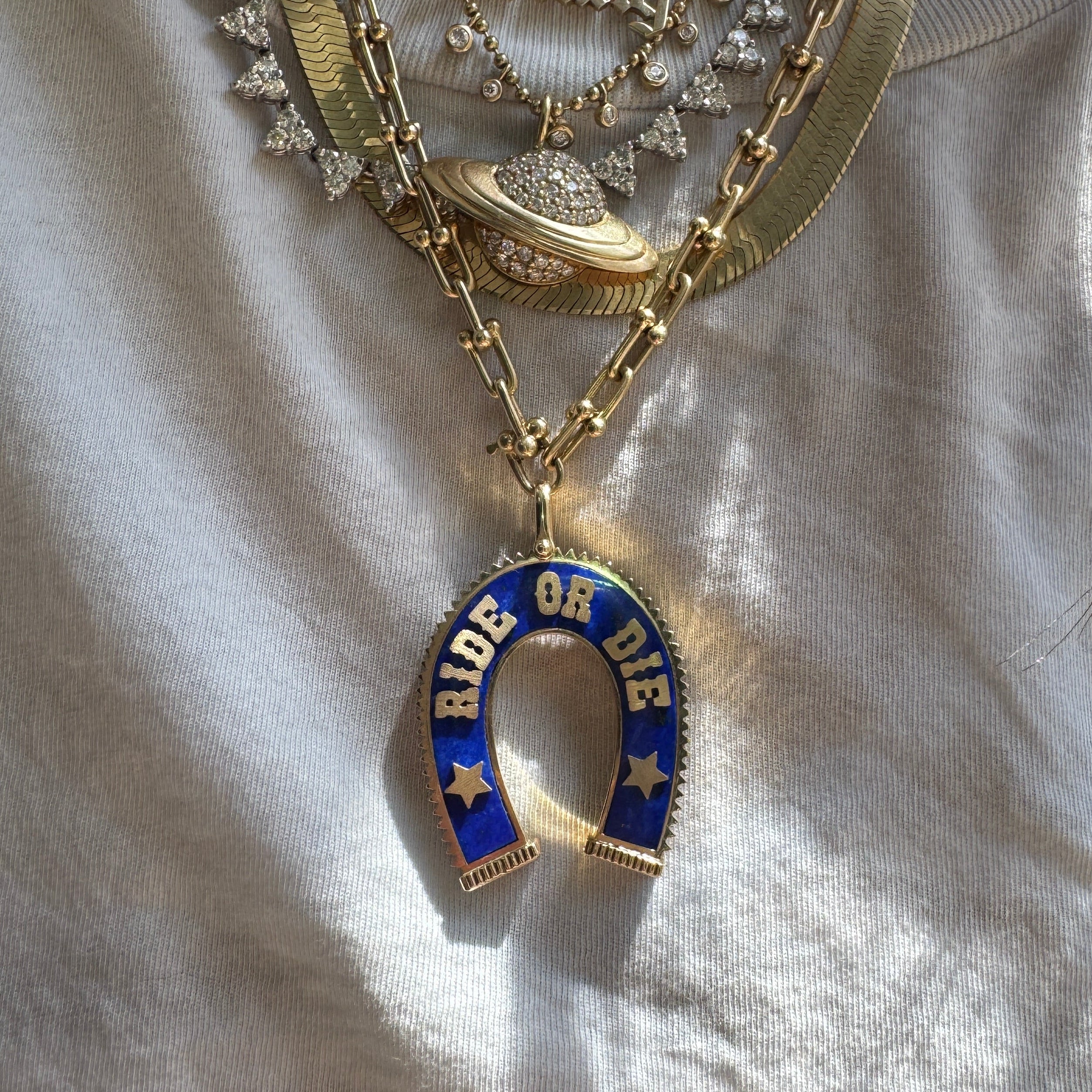 The CV Horseshoe Pendant