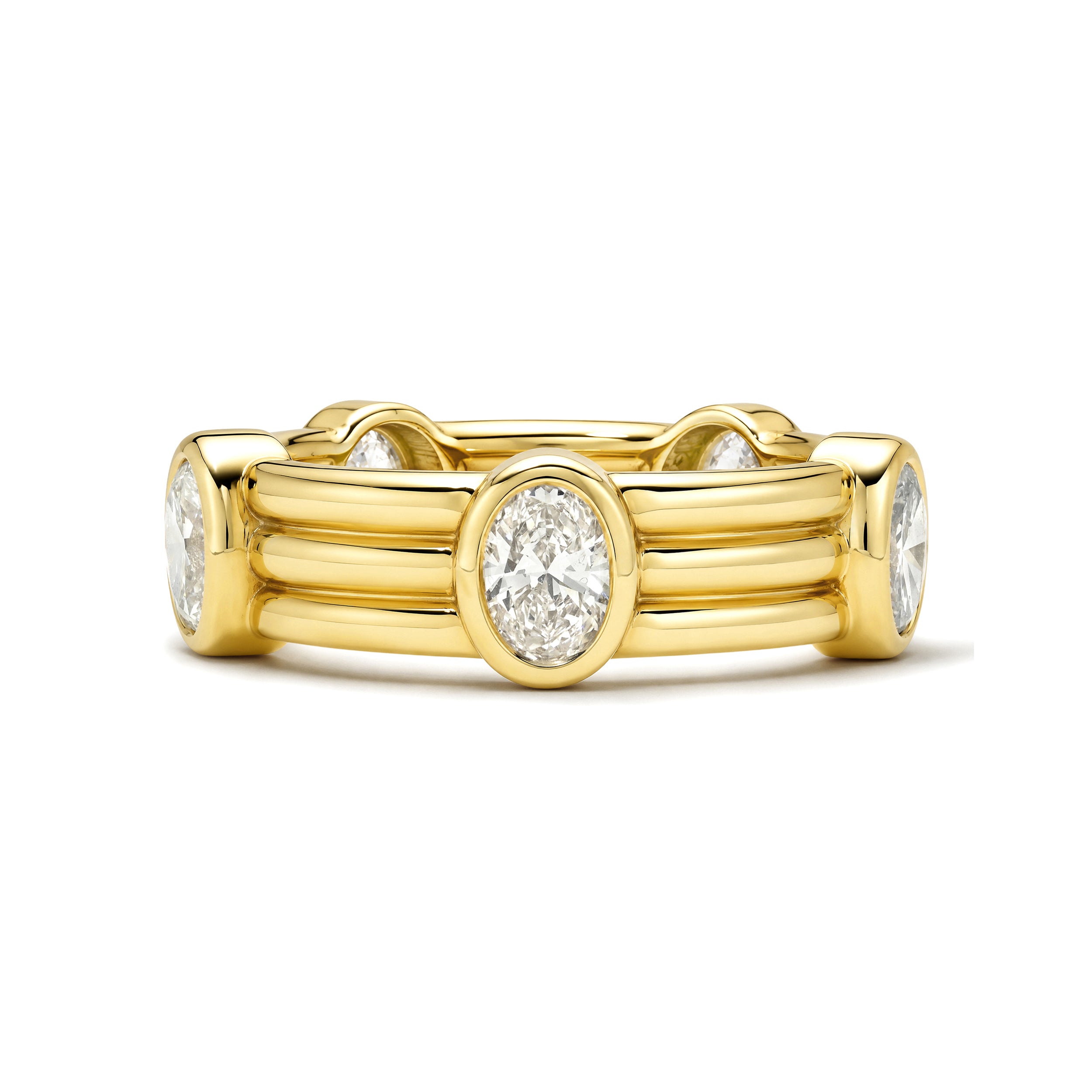 Gold ring with oval diamonds on a white background