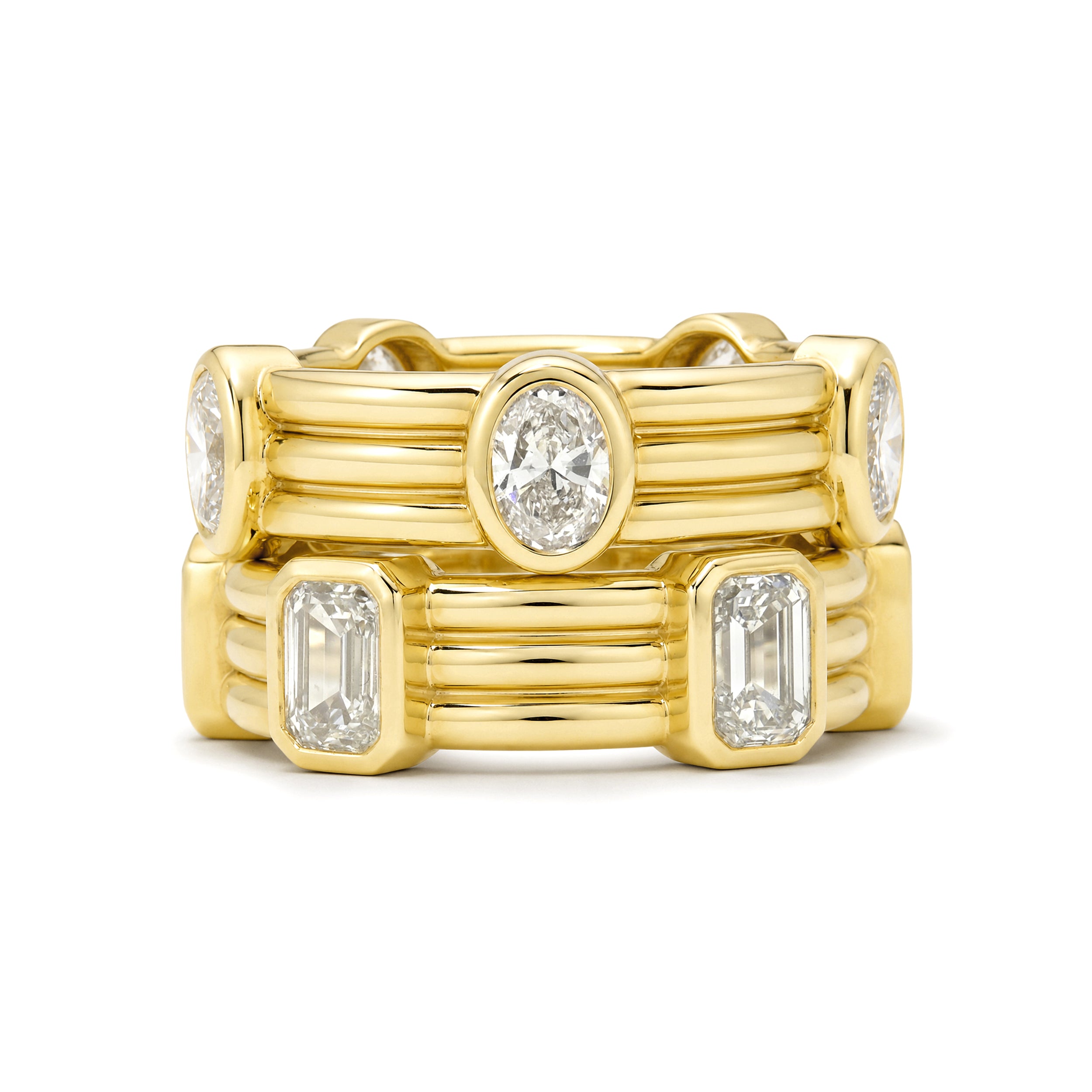 Gold ring with diamond accents on a white background